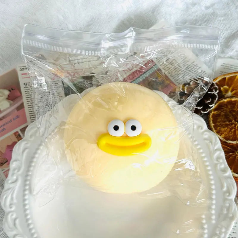 Round Dumpling Squishy Toy with Big Eyes and Smiling Mouth [YQT:BZ-261010-005:361a40270b7ab112]